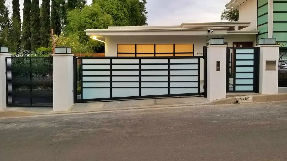 Black aluminum and glass driveway gate