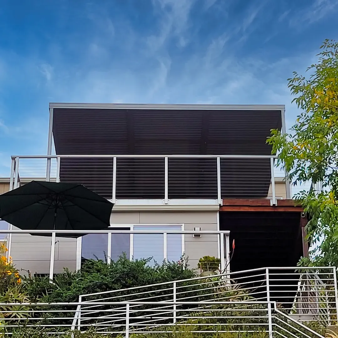 Black Profile 24 Pergola, installed by Mulholland Brand