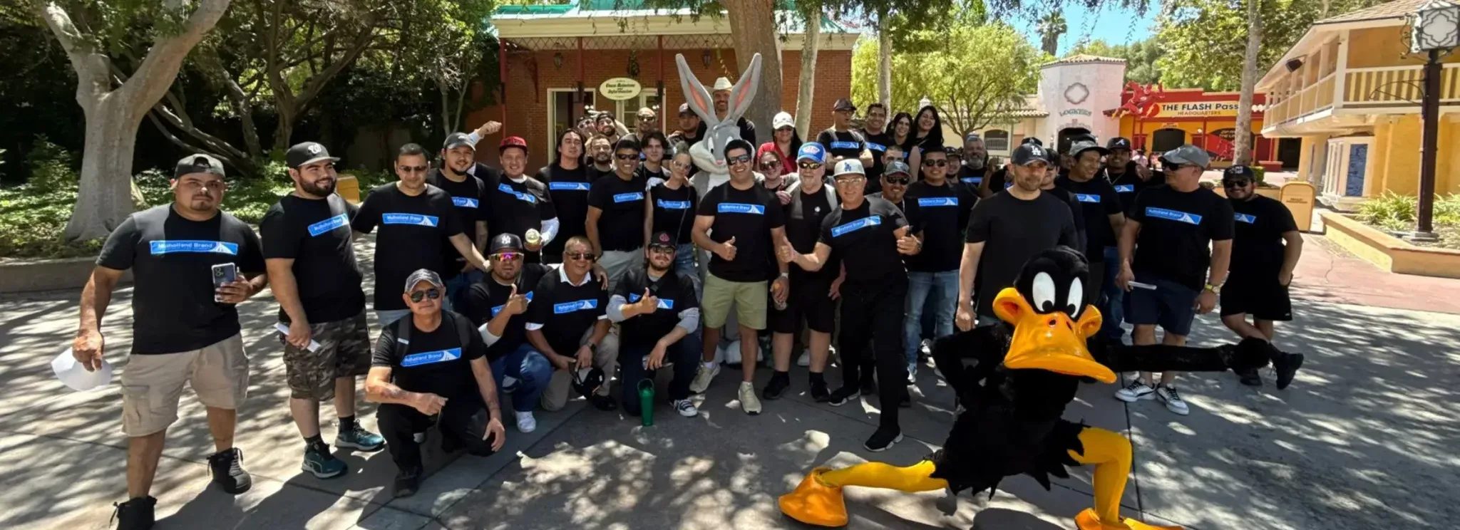 The Mulholland Brand team photographed together at a company outing