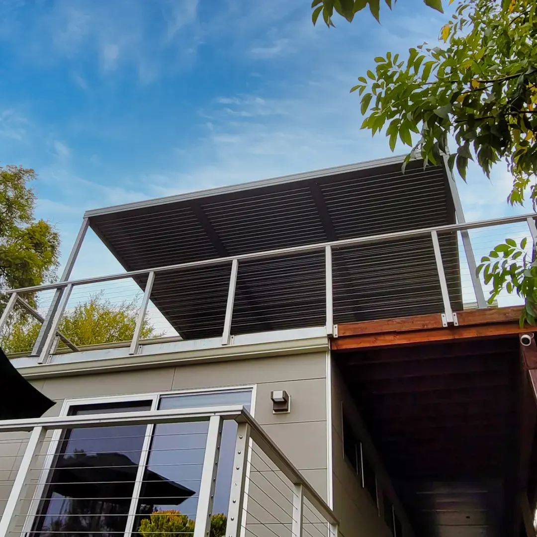 Black Profile 24 Pergola, installed by Mulholland Brand