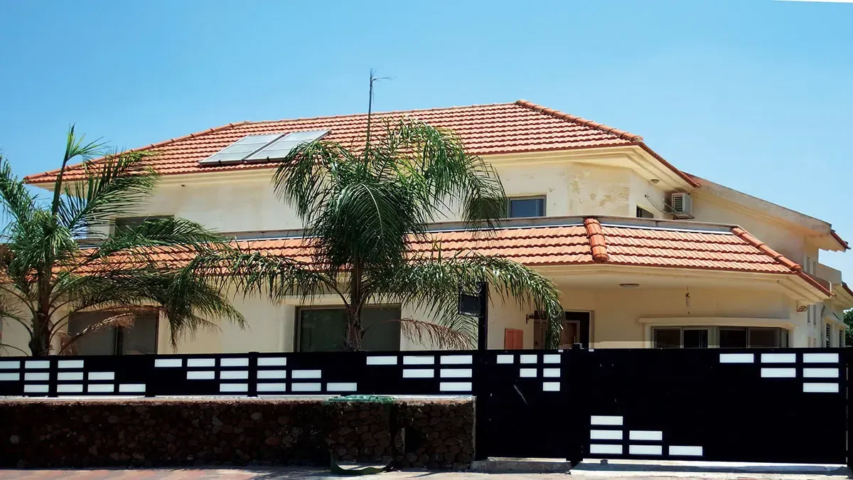 Black aluminum and glass driveway gate