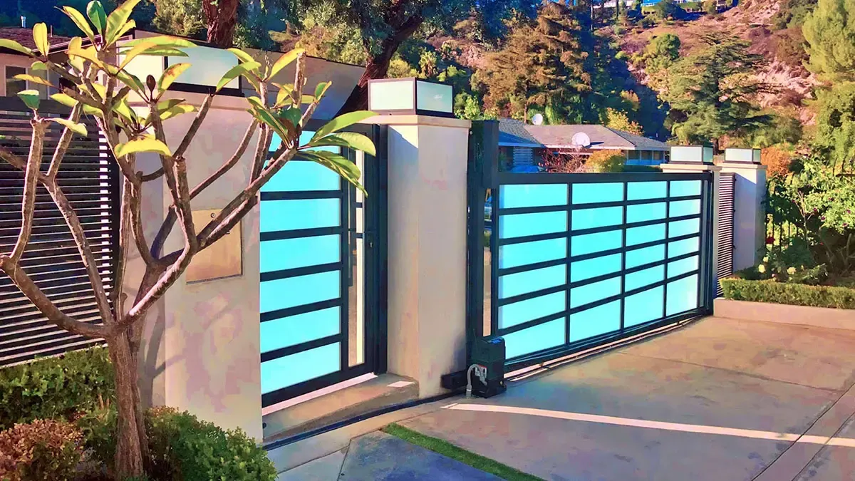 Aluminum and glass driveway gate