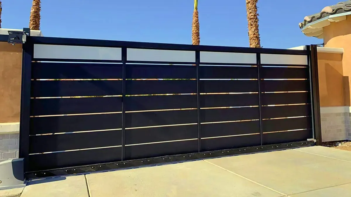 Black aluminum and glass driveway gate