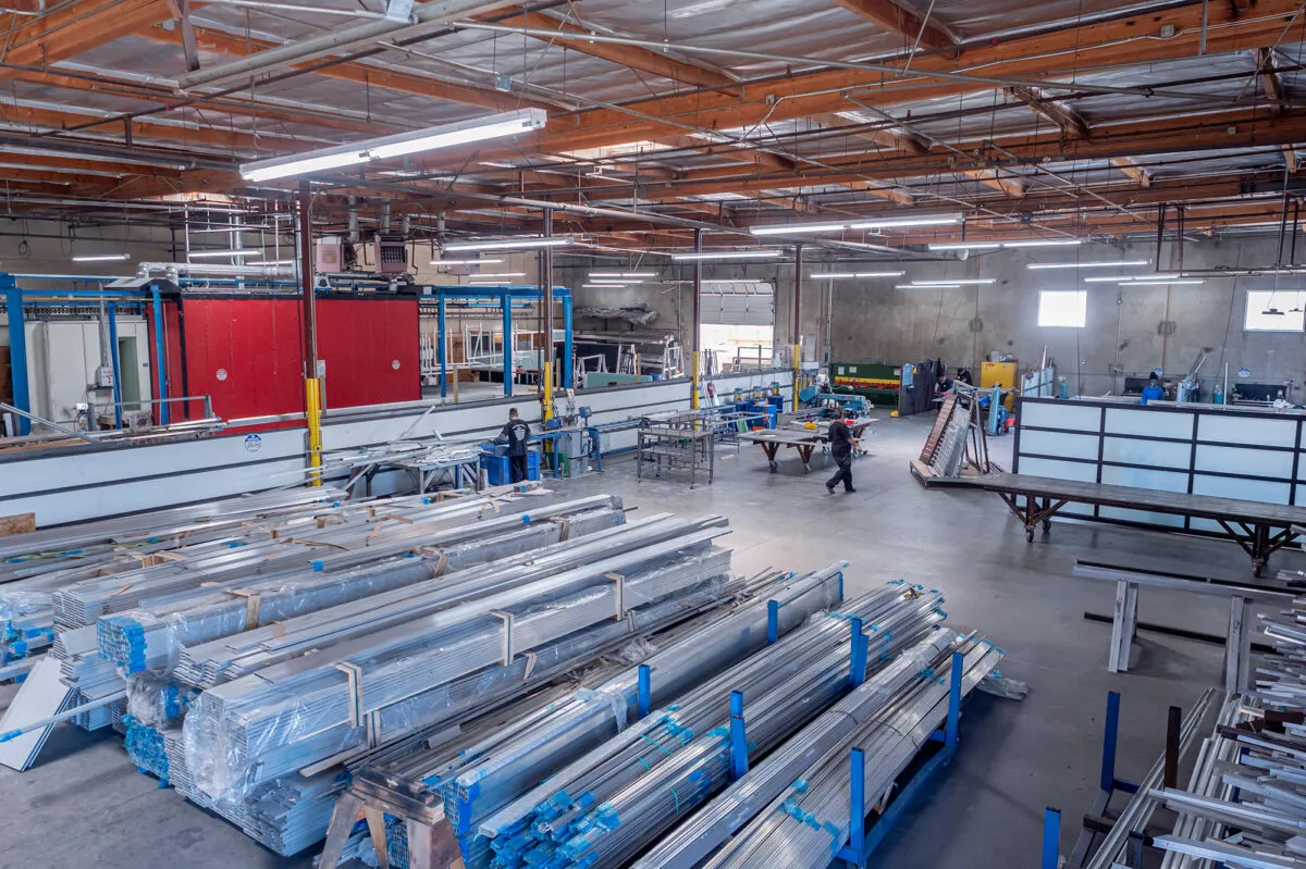 The Mulholland Brand fabrication floor in Canoga Park, stacked with aluminum stock