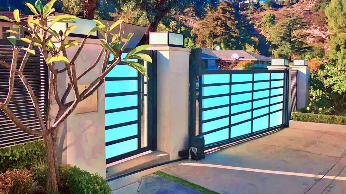 Black aluminum and glass driveway gate