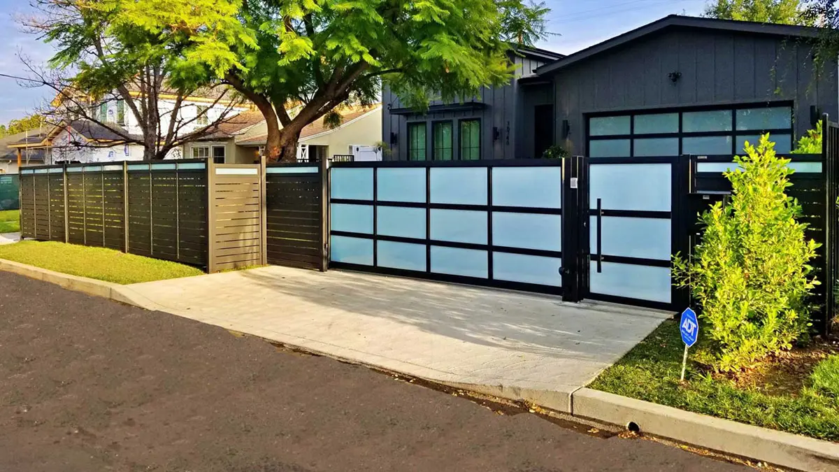 Black aluminum and glass driveway gate