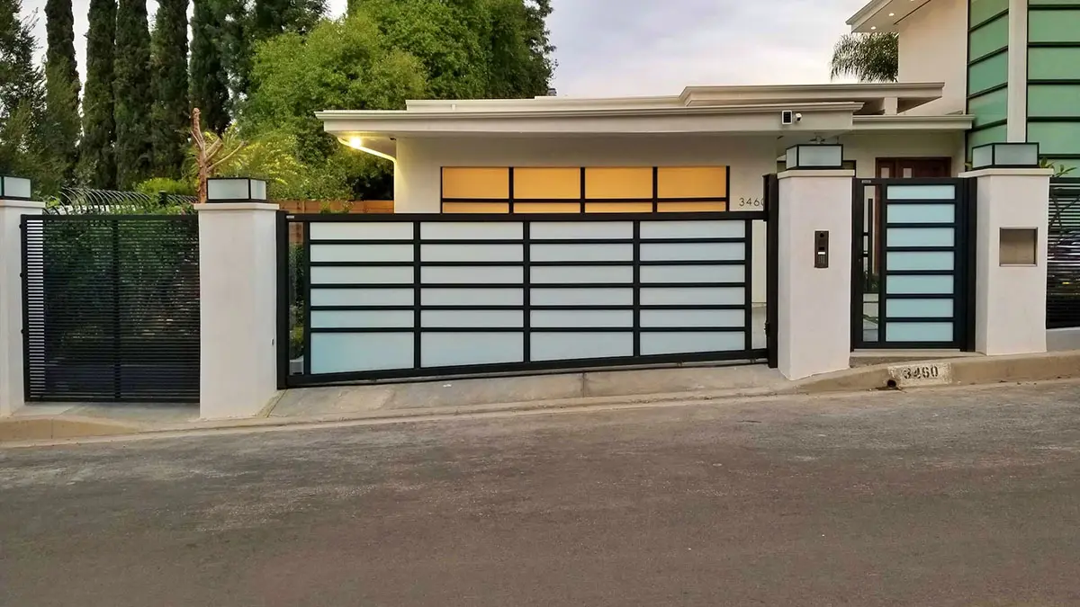 Black aluminum and glass driveway gate