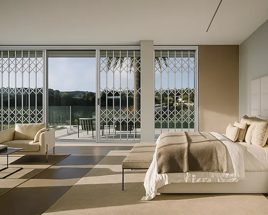 Retractable security bars on a modern home