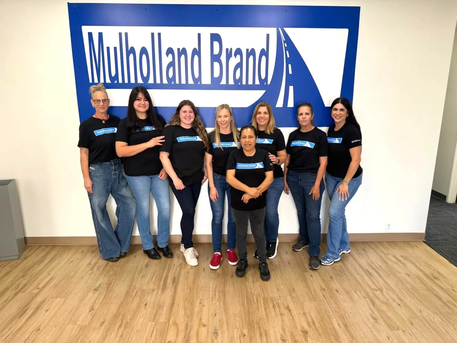 The Mulholland Brand office team at the Canoga Park showroom