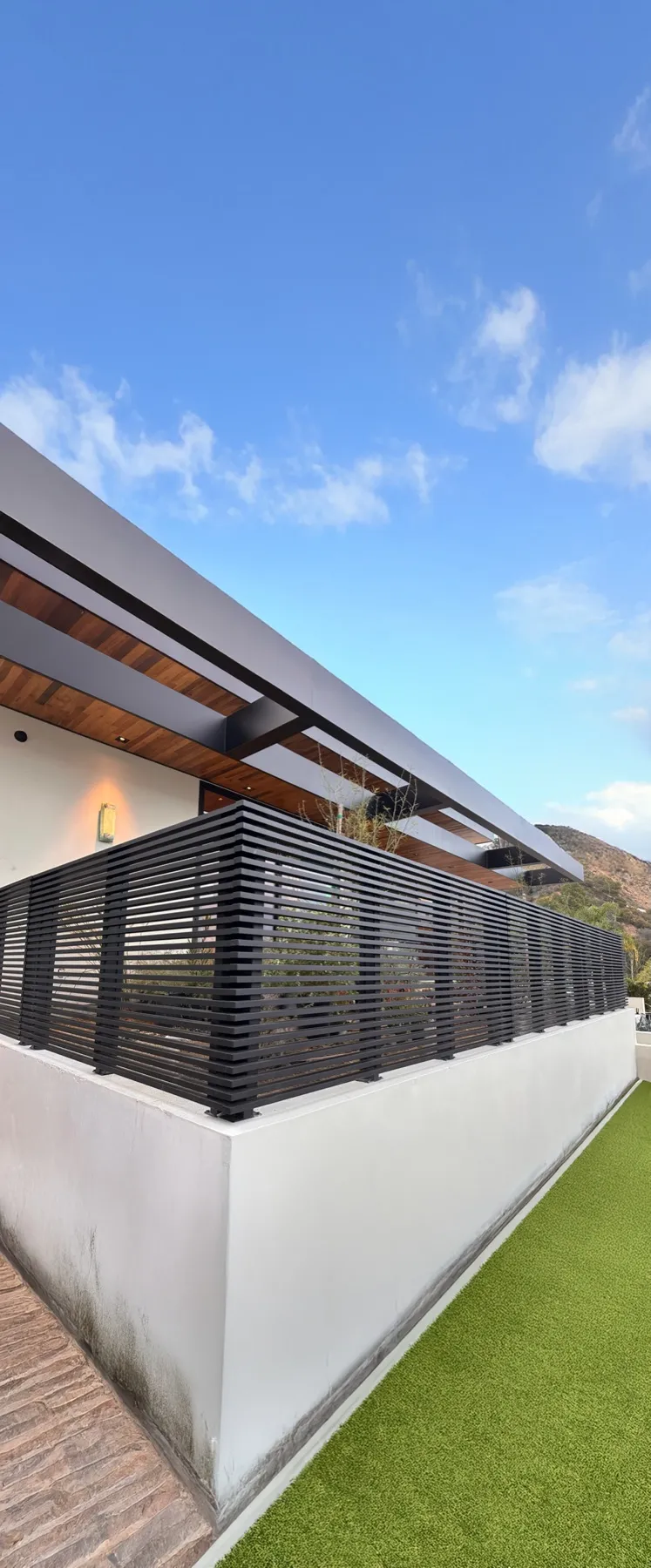 Black Hi-Tech railing installed by Mulholland Brand