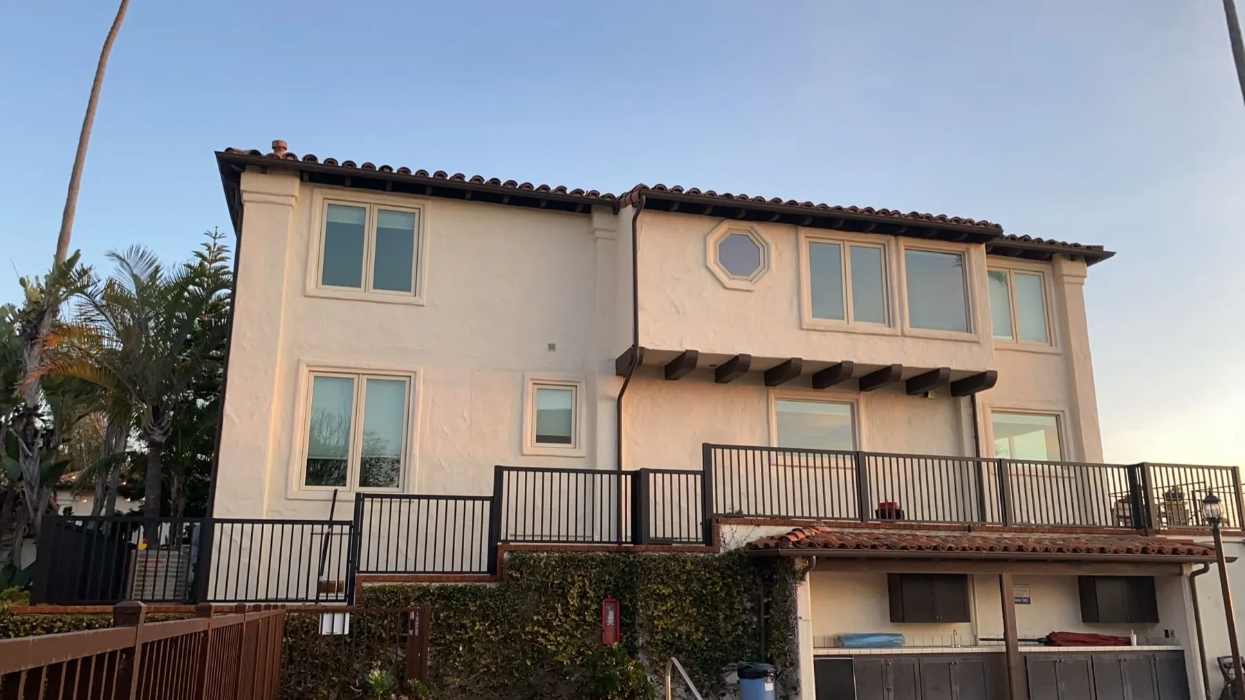 Black aluminum railing installed by Mulholland Brand