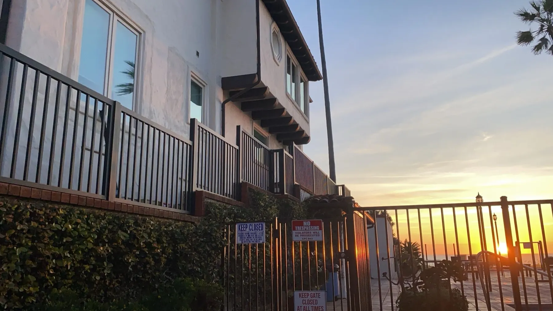 Black aluminum railing installed by Mulholland Brand