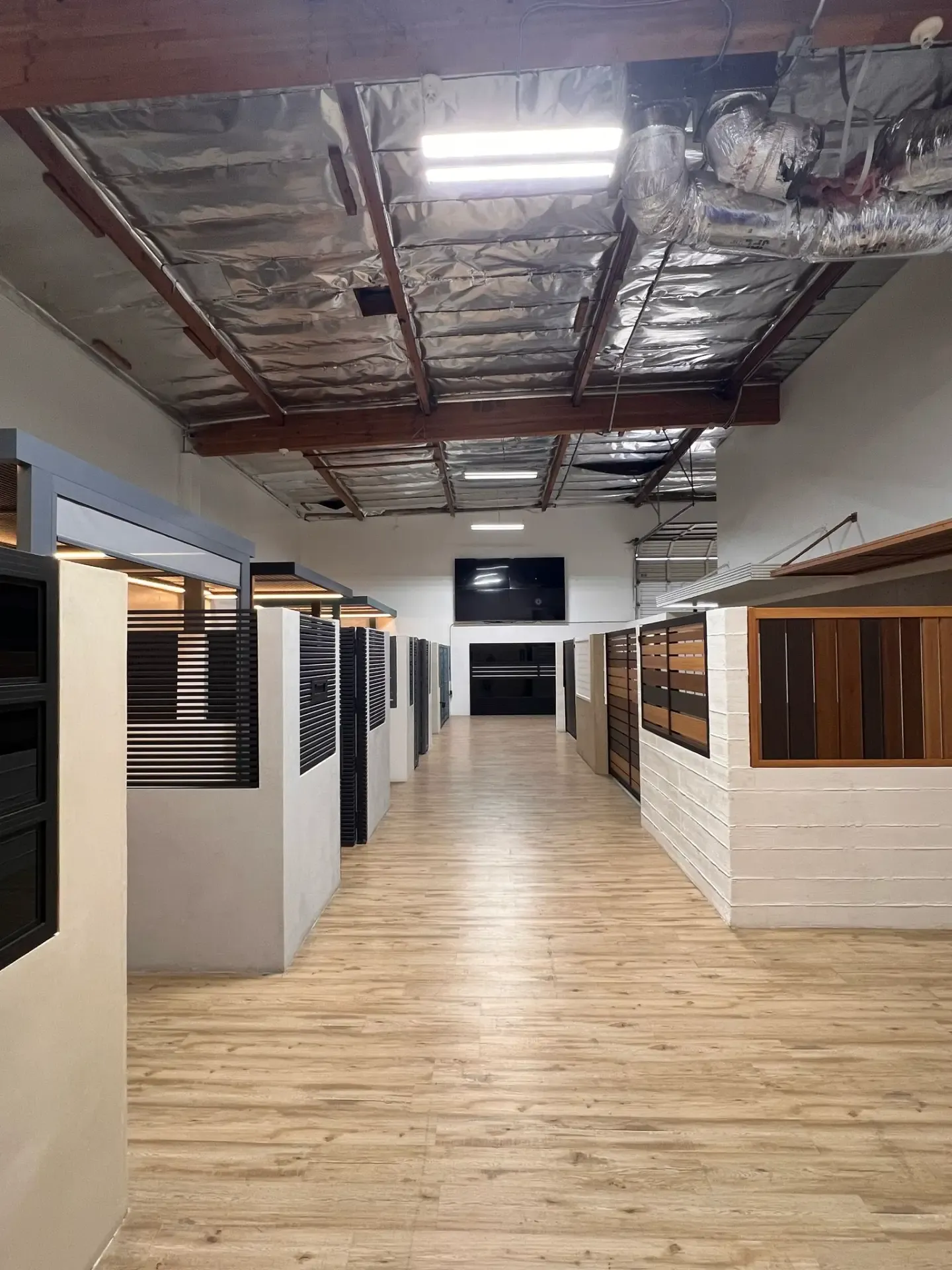 Inside the Mulholland Brand showroom in Canoga Park, with full-size gate and fence samples on display