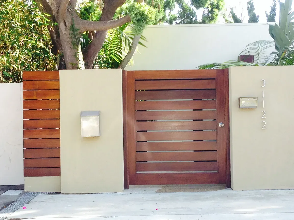 Horizontal slated wood entry gate with keypad