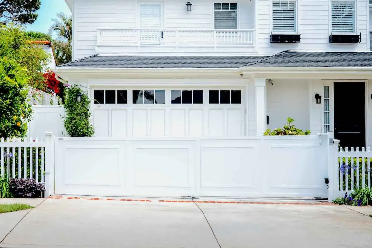 white aluminum sliding driveway gate