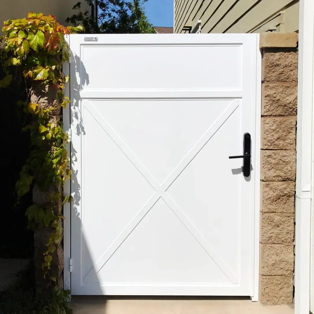 White Solid Pedestrian Gate, installed by Mulholland Brand
