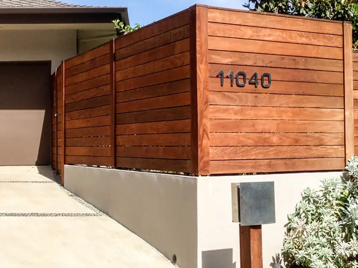 Wood fence with house number