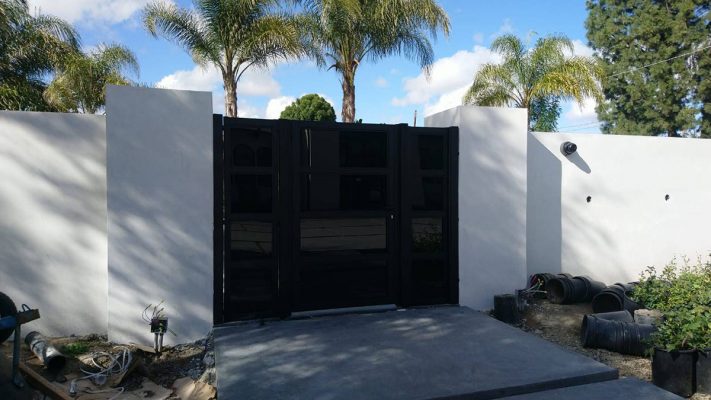 Black aluminum and glass entry gate