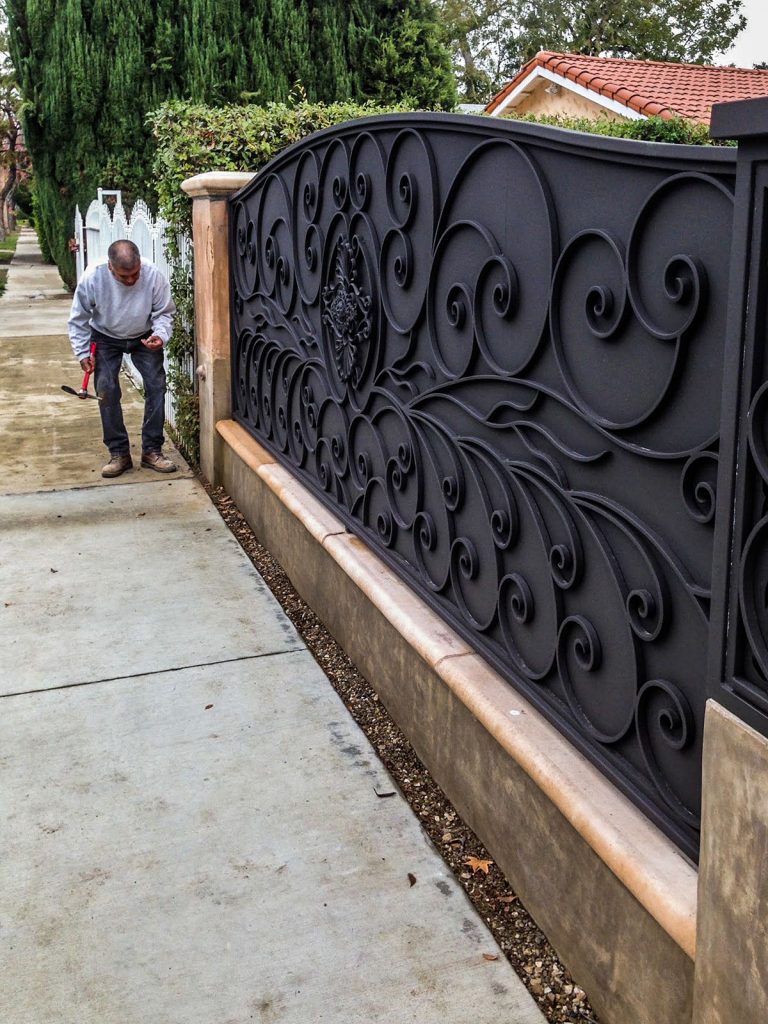 Iron fence with swirled design