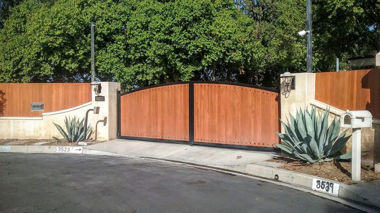 Wood driveway gate and fence