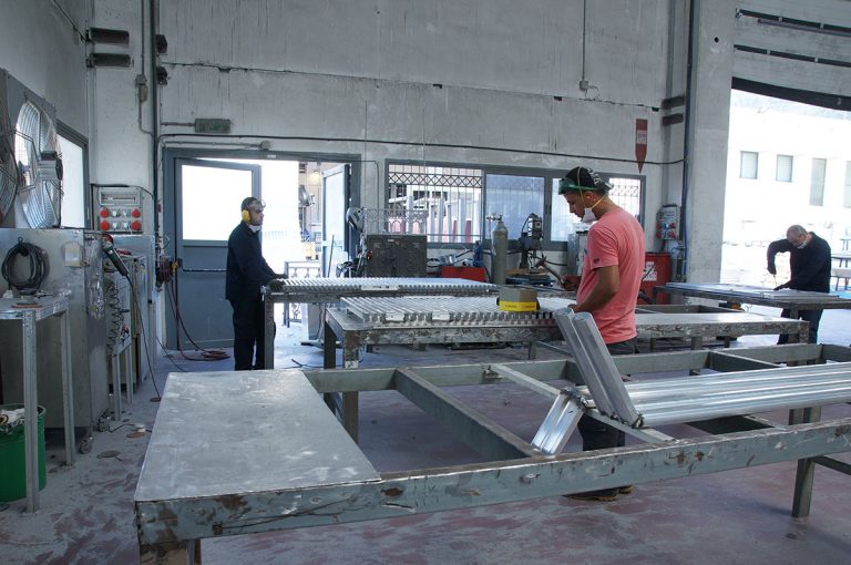 workers in manufacturing plant