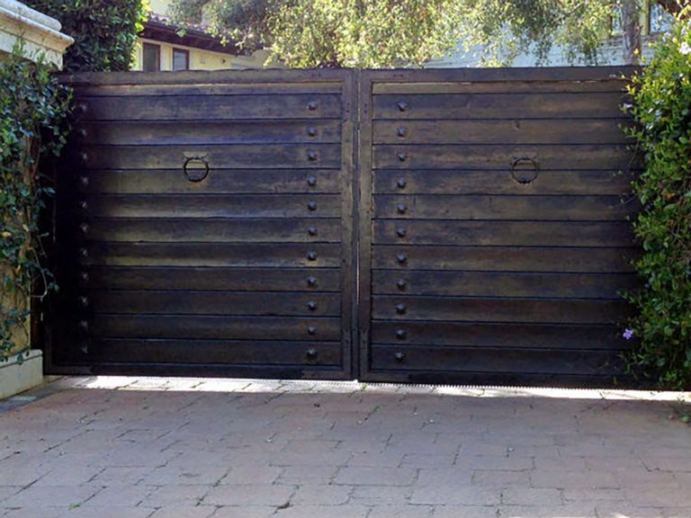 Dark wood driveway gate