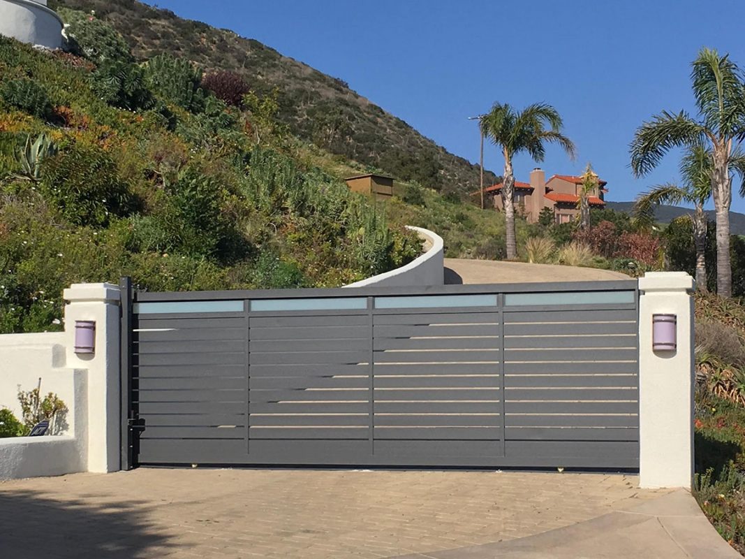 beach community glass and aluminum driveway gate