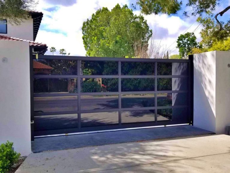 Black aluminum and black glass driveway gate