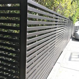 Iron fence with horizontal slats