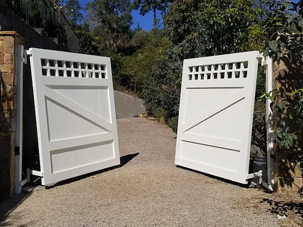 White hillside wood gate