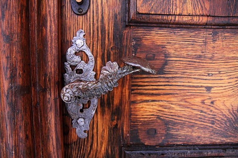 Decorative door handle on wood gate