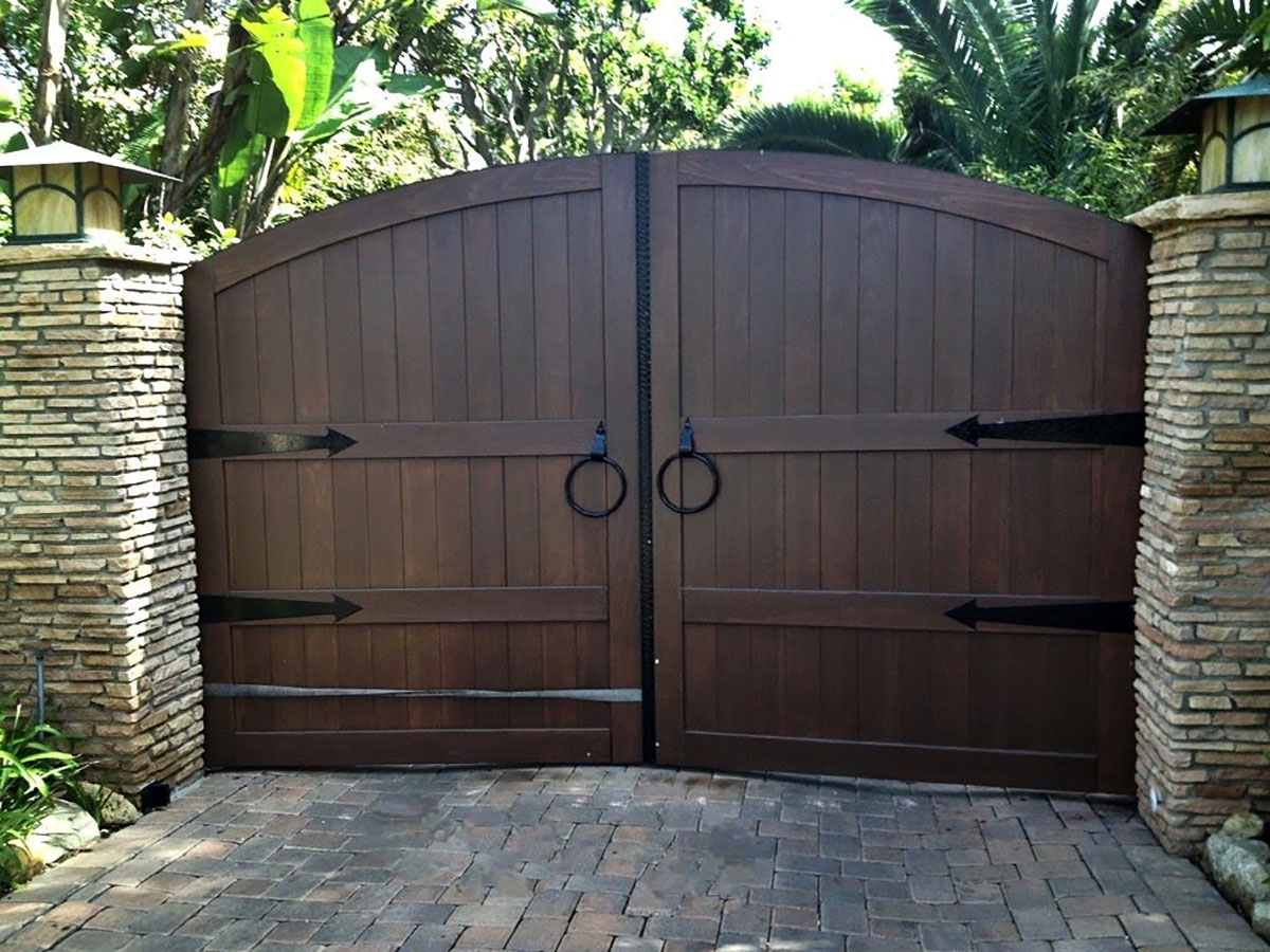 Dark wood driveway gate