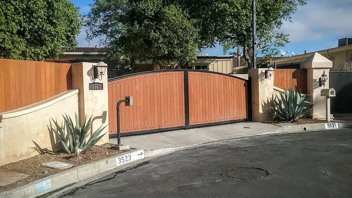 Wood driveway gate and fence