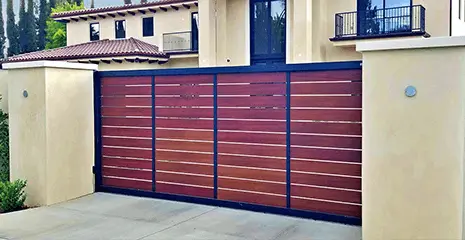 Woodlike aluminum driveway gate
