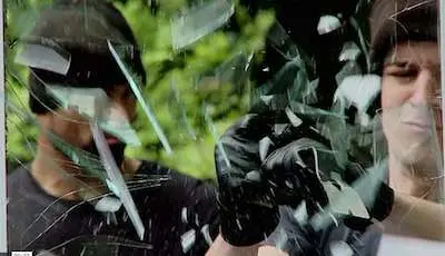 Burglars Breaking Glass