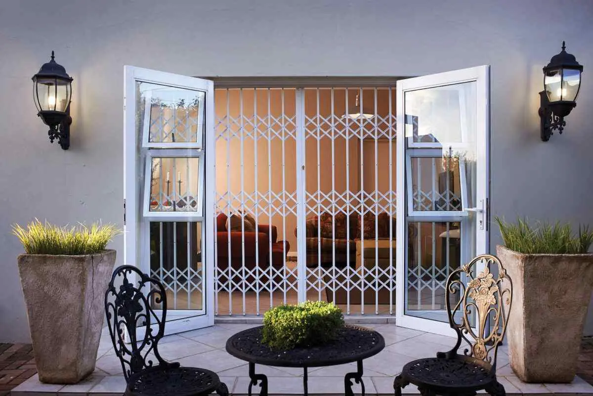 Barrier at the glazed doors of an open-plan living room