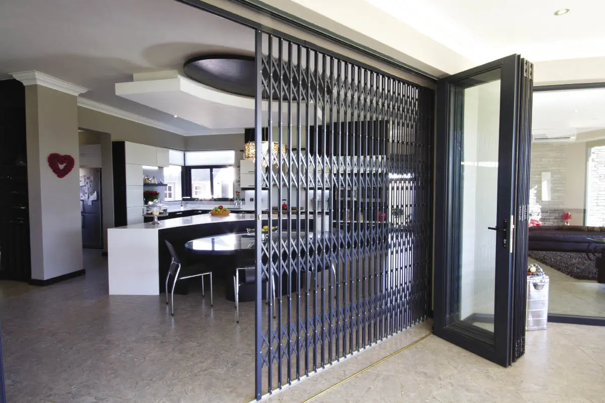 Barrier dividing a living room from the terrace