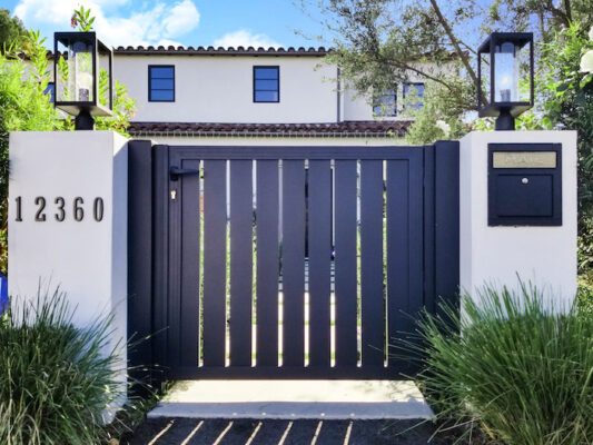 pedestrian walk-way gate in Alhambra, Ca. Manufactured and installed by Mulholland Brand.