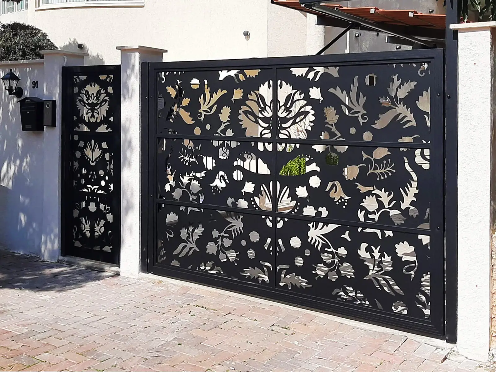 Laser- cut gates, Mulholland Brand, Aluminum